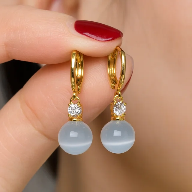 Pendientes de aro chapados en oro 18k con perla gris suave – Balearyc