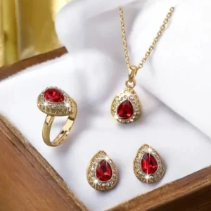 Pendientes y anillo BALEARYC dorados con piedras rojas brillantes