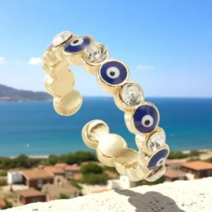 Anillo dorado ajustable con diseño de ojo turco en azul y dorado
